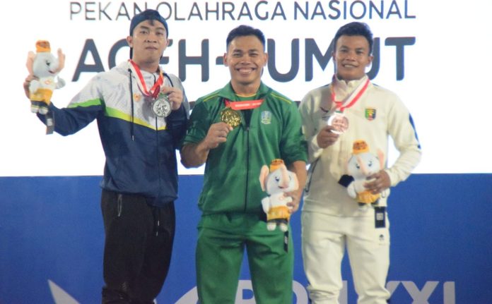 nasional-eko-yuli-peraih-medali-emas-bagi-jatim-di-pon-xxi-2024-tak-akan-pensiun-sebelum-dikalahkan